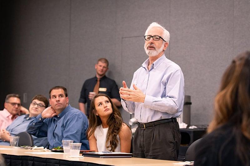 A faculty member presents at a CCBP meeting